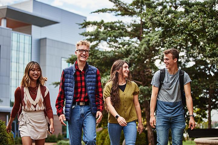 Students walking by the Interdisciplinary Science and Engineering Building